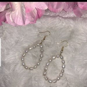 Simulated pearl earrings.